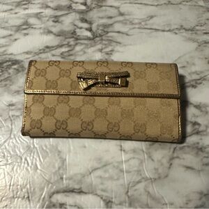 Gucci monogram wallet bifold